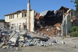 one of Lemoore High School's oldest structures began coming down Wednesday, July 15 as the local high school continued its renovation efforts to modernize its campus.